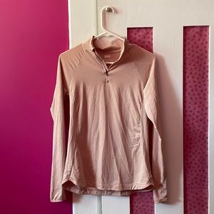 Like new. One small brown spot on left upper arm. Blush pink.